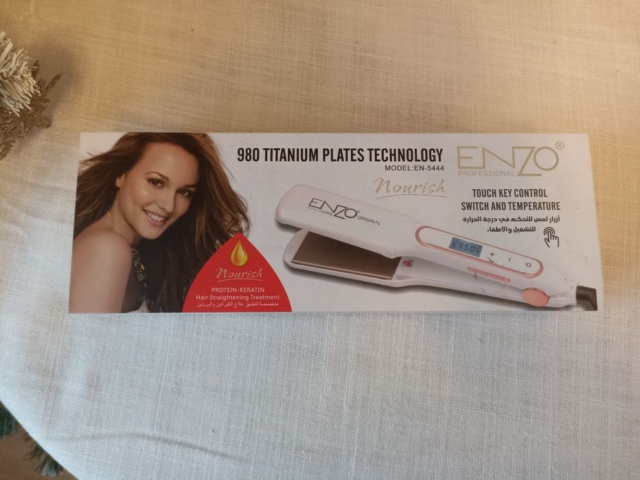 Вирівнювач волосся з регулюючою температурою