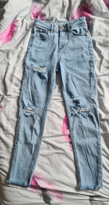 Spodnie jeansowe high rise slim z przetarciami