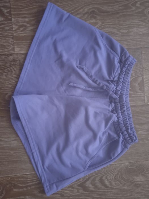 Костюм бузкового кольору