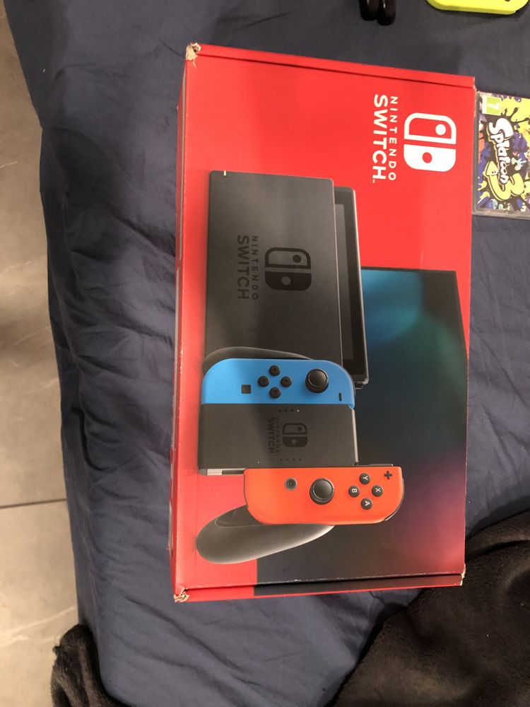 Nintendo switch + pady joycon yellow blue + 5 gier + k. Pamięci 128GB