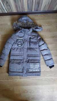 Продам зимову куртку на підлітка 11-12 років