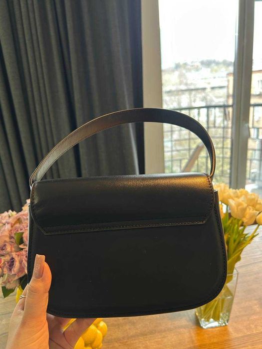 Сумка Diesel від Анни Трінчер