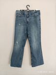 Spodnie z dziurami jeans Sinsay 42