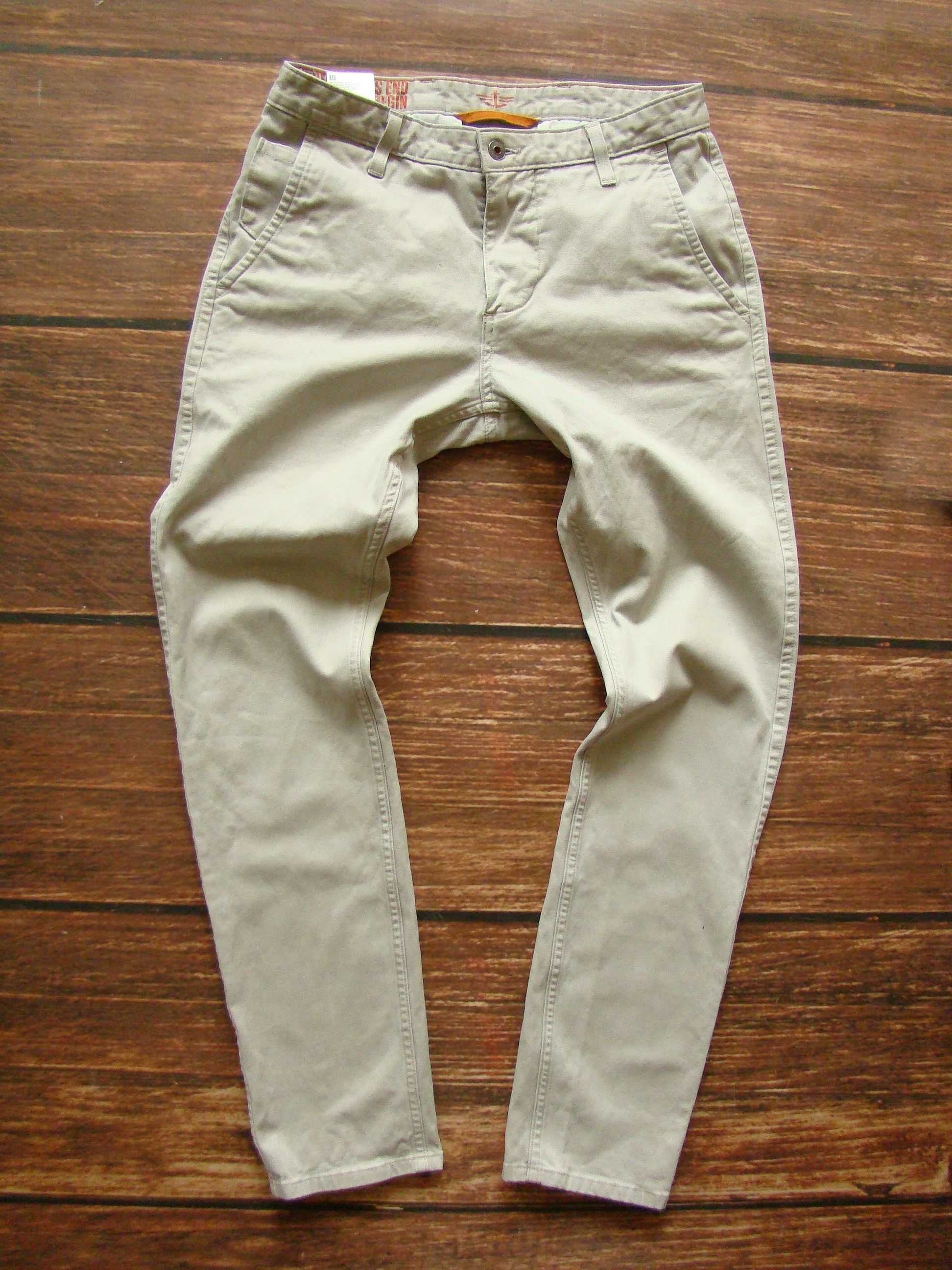 Dockers świetne markowe spodnie jak nowe rozm W31 L32 pas: 80 cm