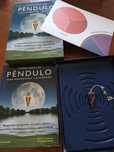 Livro Como Usar O Péndulo. Inclui gráfico e um péndulo.