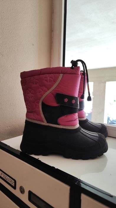 Botas de neve de criança
