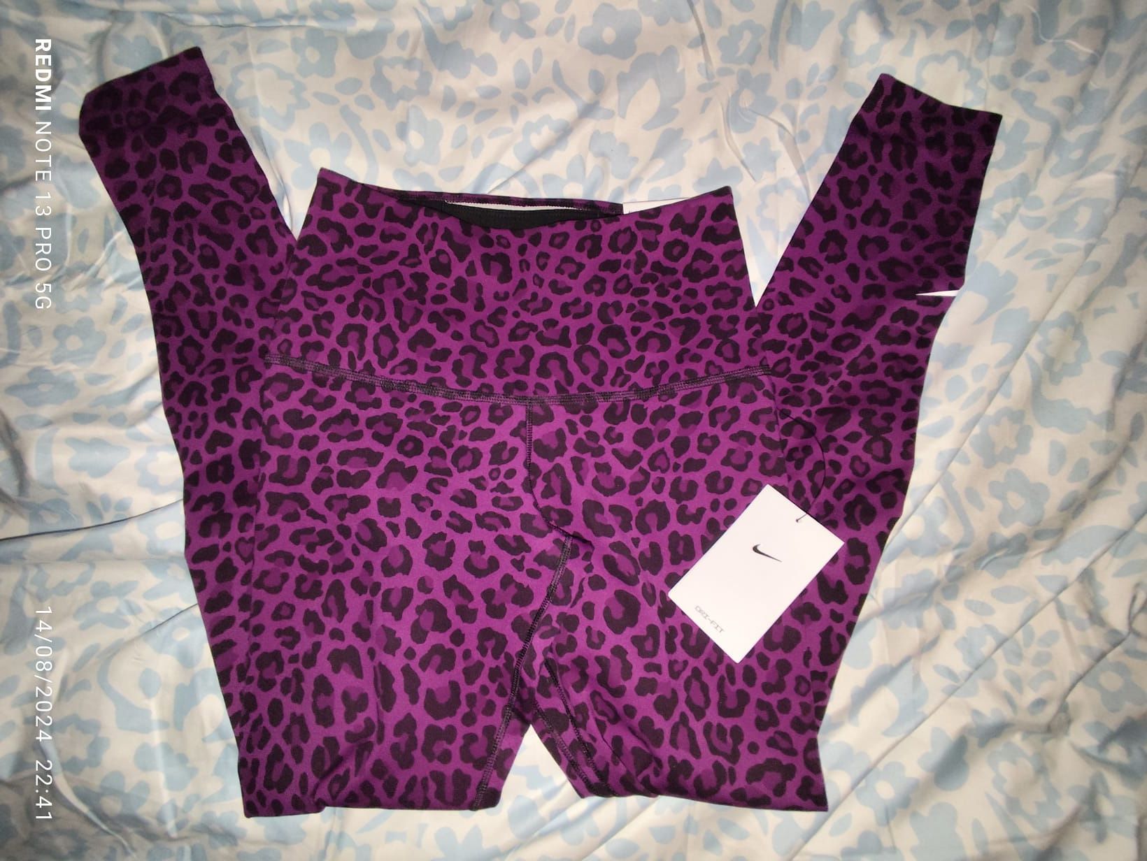 Legging roxa nike.