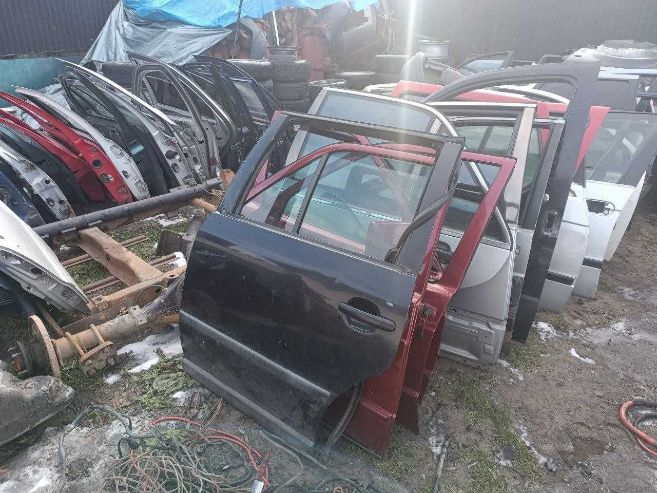 Двері передні праві ліві задні марки авто в описі