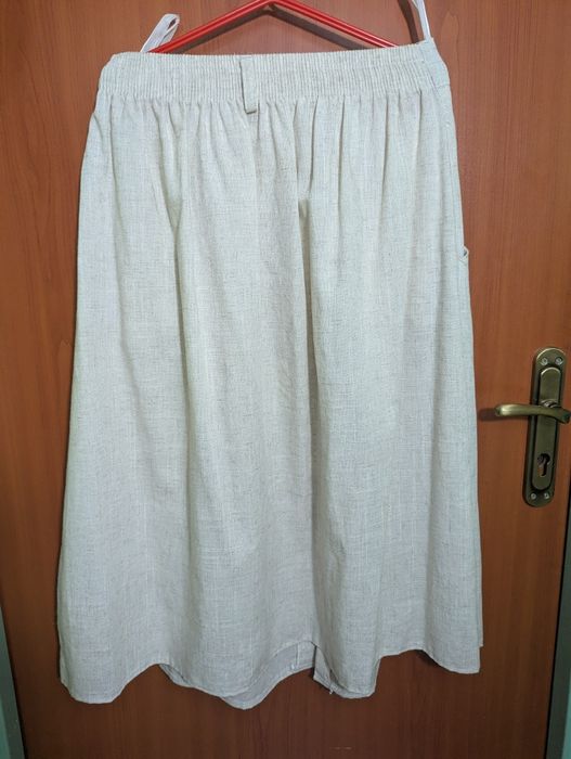 Kremowa dluga spodnica na gumce z kieszeniami rozmiar L