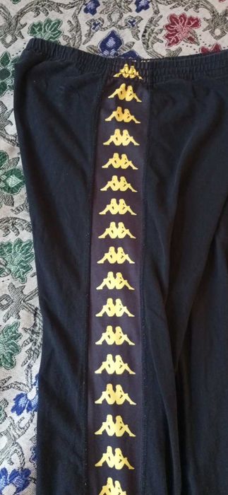 Продам штани Kappa з жовтими лампасами розмір S