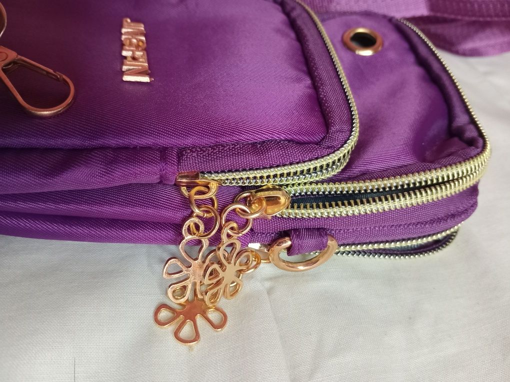 Bolsa tira colo compacta NOVA