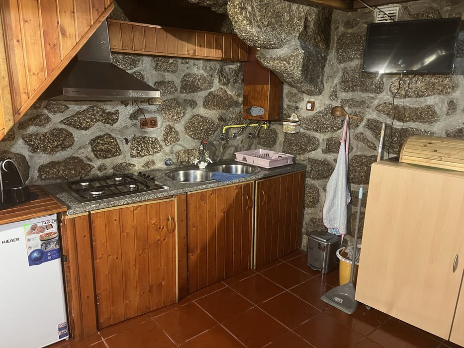 Casa de pedra e madeira toda restaurada.