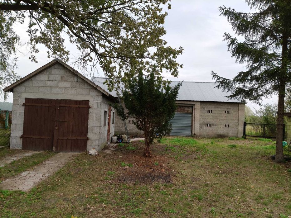 Siedlisko 1700m2 z domem i budynkami gospodarczymi + ziemia rolna.