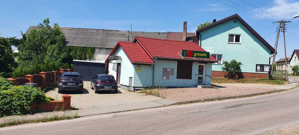 Działka zabudowana budynkiem usługowym (sklep)