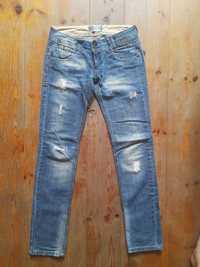 Spodnie jeansowe Zara z przetarciami r. 38