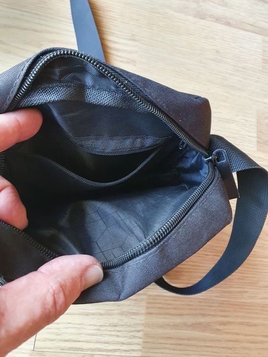 Bolsa homem como nova