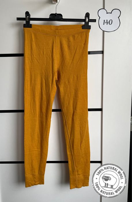 Welniane dziewczece leginsy termiczne 140 musztardowe 100%merino wool