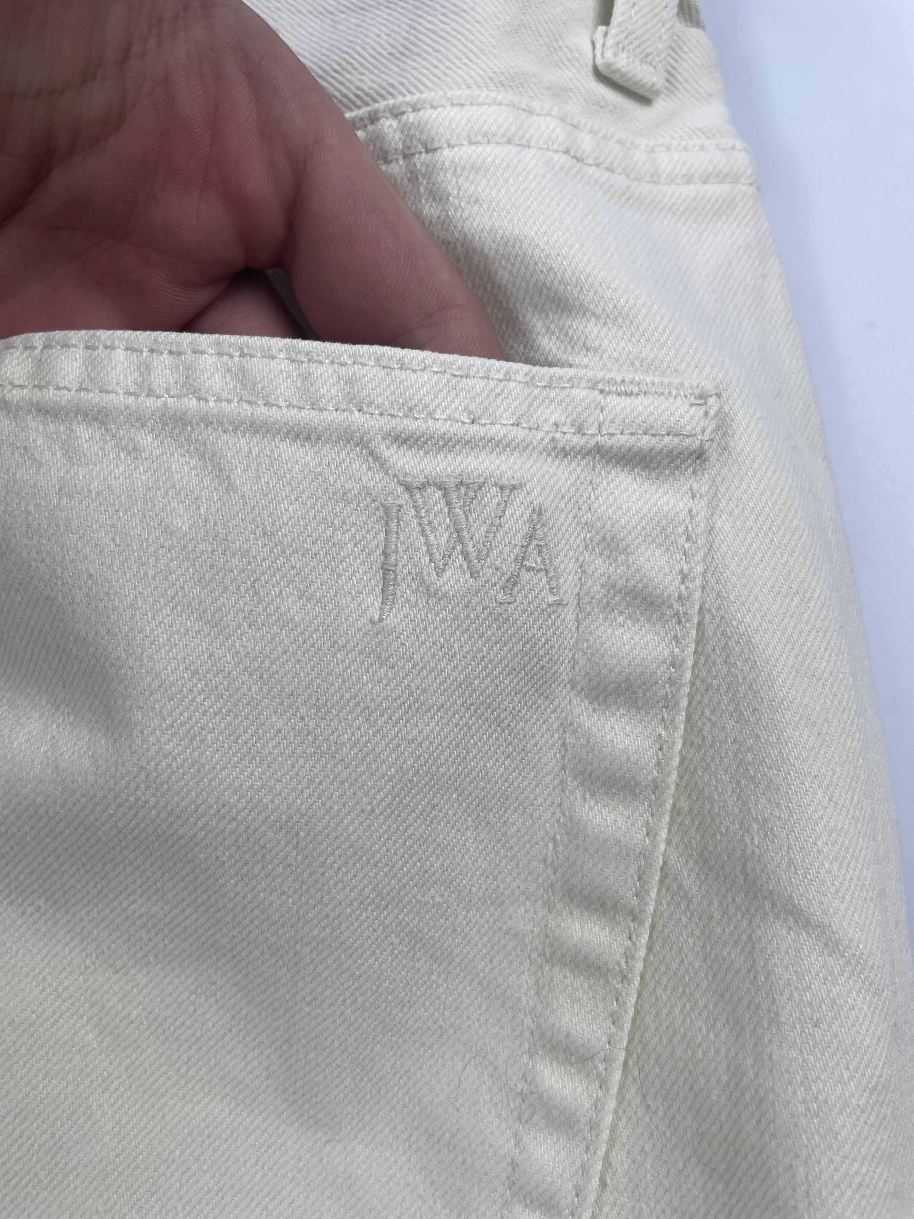 J.W. Anderson białe spodnie dżinsowe szerokie męskie uniqlo