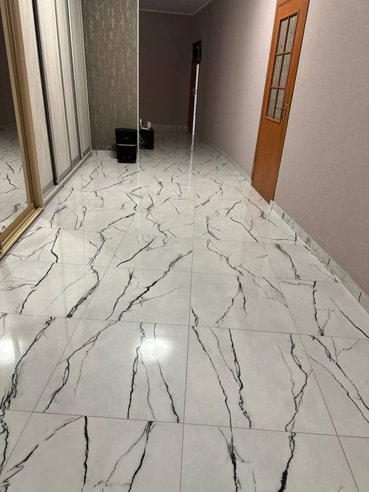 Облицювання плиткою , плиточник