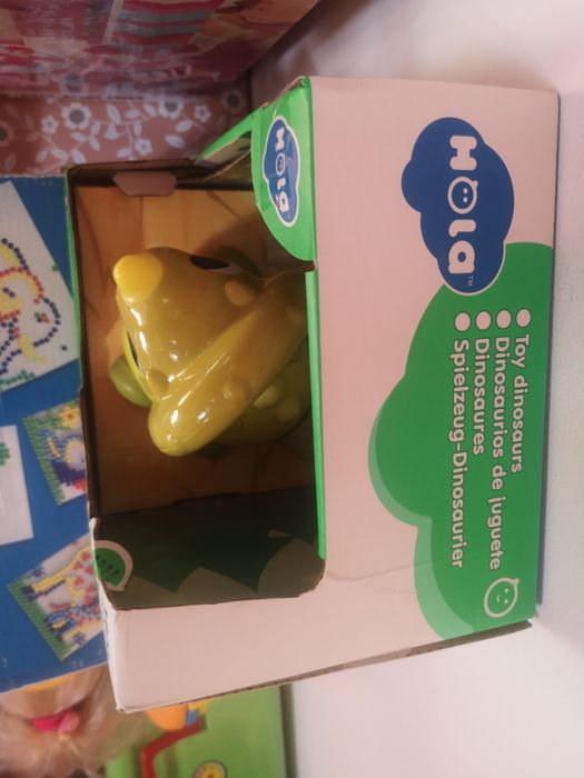 Каталка-динозаврик електронна Hola Toys музична 18х12 см з підсвічуван