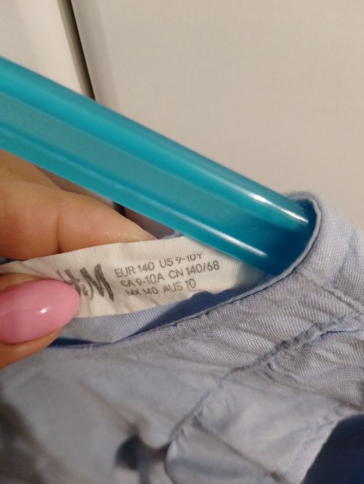 Elegancka błękitna bluzeczką HM rozmiar 140