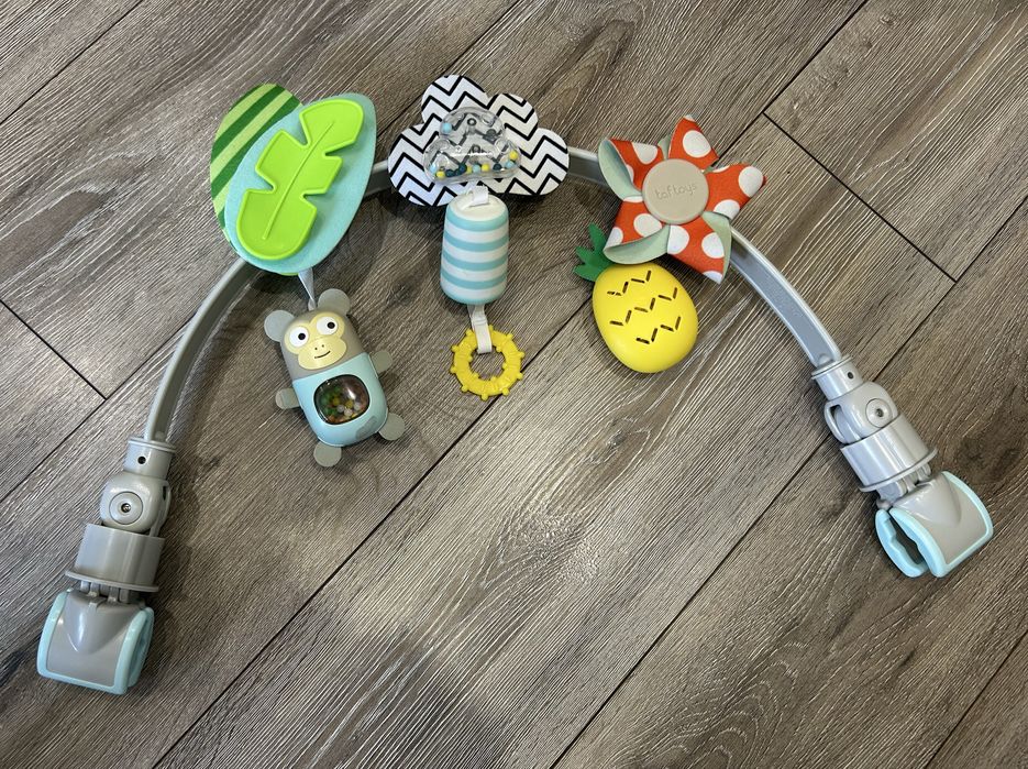 Розвиваюча дуга для коляски Taf Toys та водяний килимок