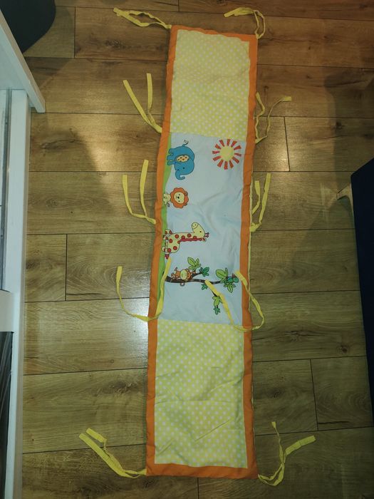 Ochraniacz do łóżeczka dziecięcego z troczkami