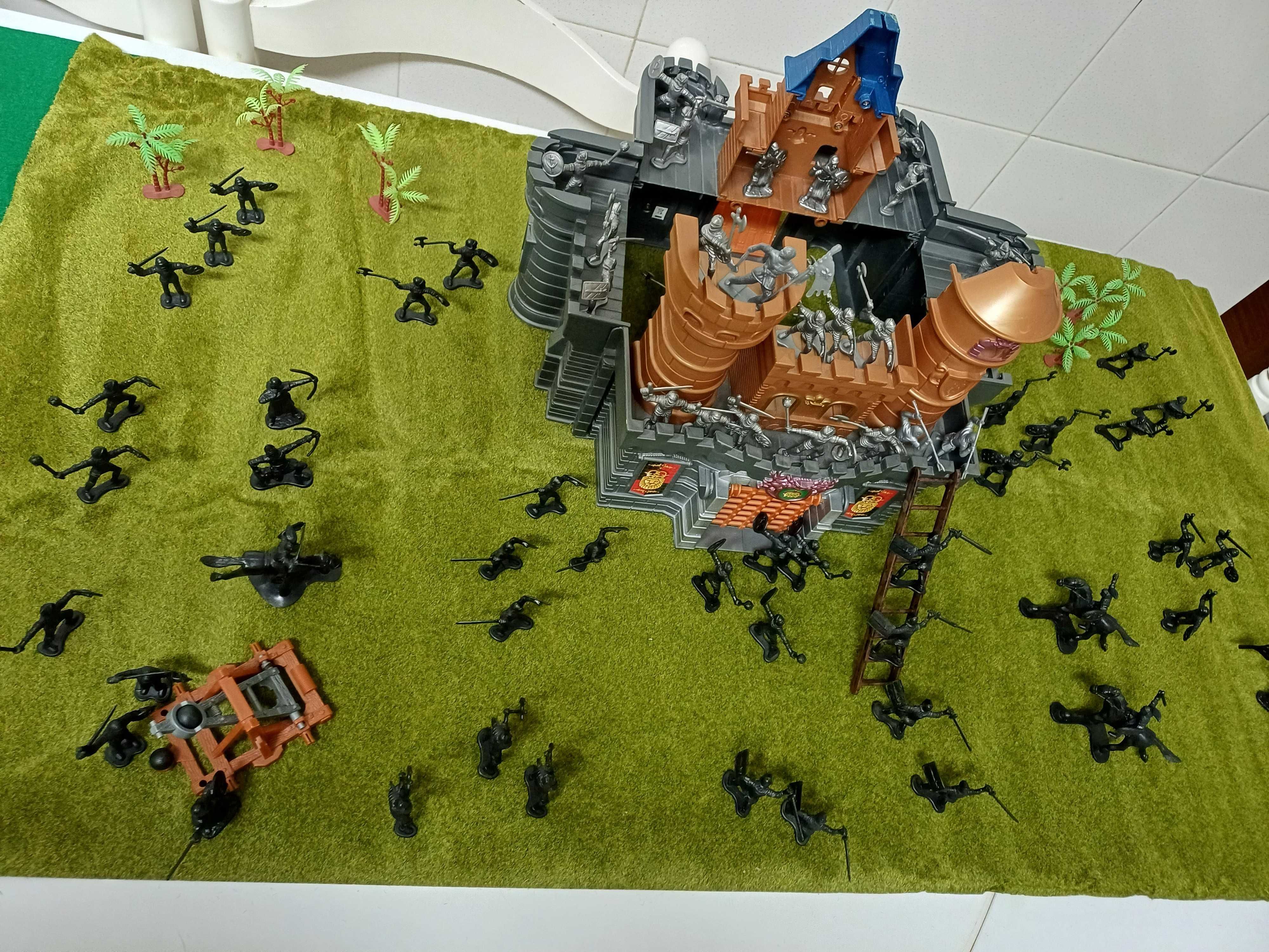 Castelo com exércitos em guerra