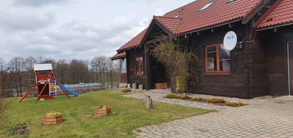 Mazury, dom całoroczny.  Urlop nad wodą w Domu na Wysokim Brzegu.