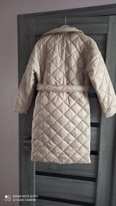 Жіноче стьобане пальто курточка з поясом