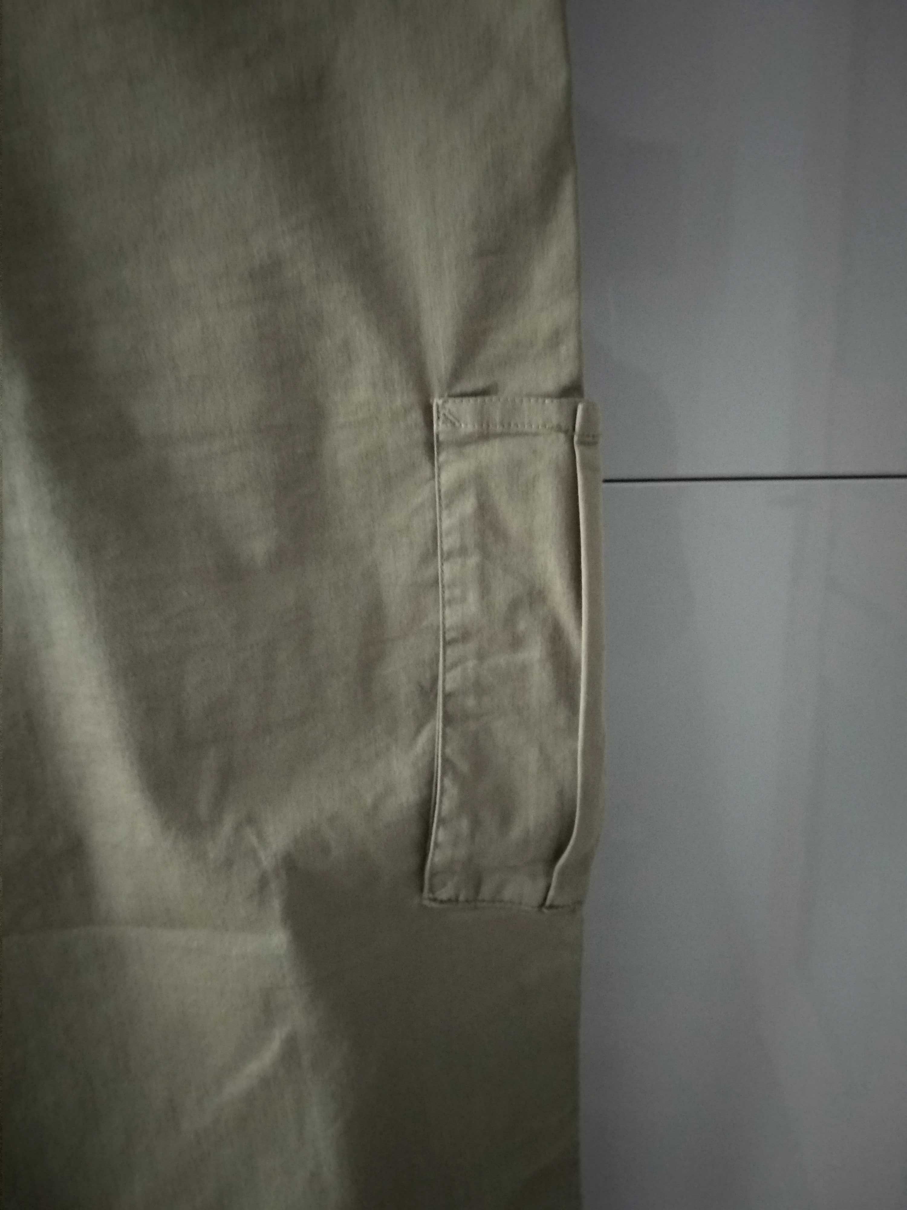 Spodnie materiałowe, rozmiar 50, pas 94 cm.
