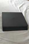 PS4 Slim 1TB + 4 jogos
