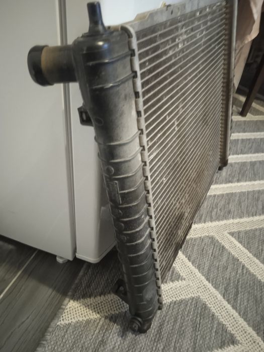 Продам радіатор Авео.