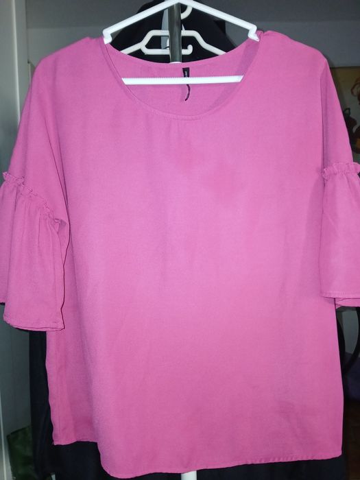 Blusa cor de rosa tecido leve