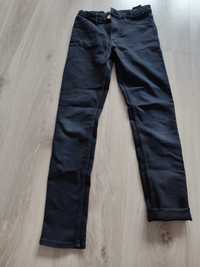 Czarne jeansy dla dziewczynki H&M 146