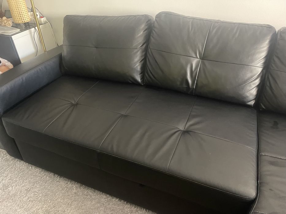 Sofa com chaisse long com arrumacao