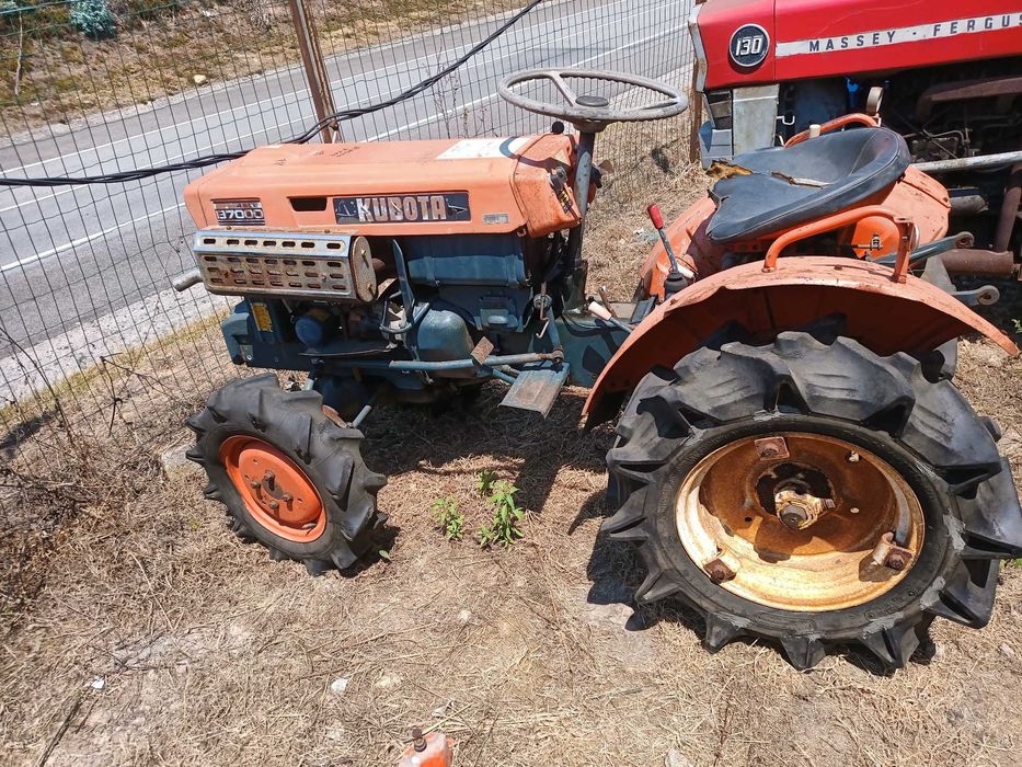 trator kubota com frese
