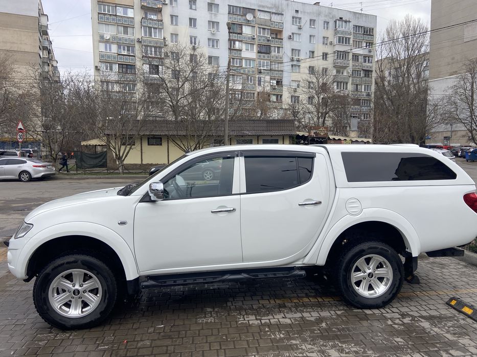 Митсубиси  l200 13 год