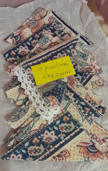 Guardanaps e bases ou pegas de cozinha