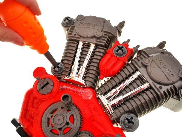 mechanik rozkręć silnik napraw zabawka + klucze