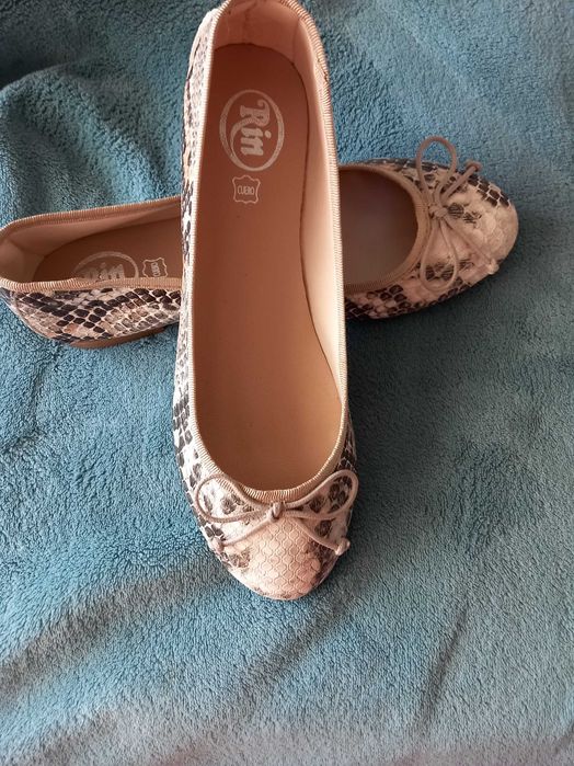 Sabrinas de pele em pele animal print