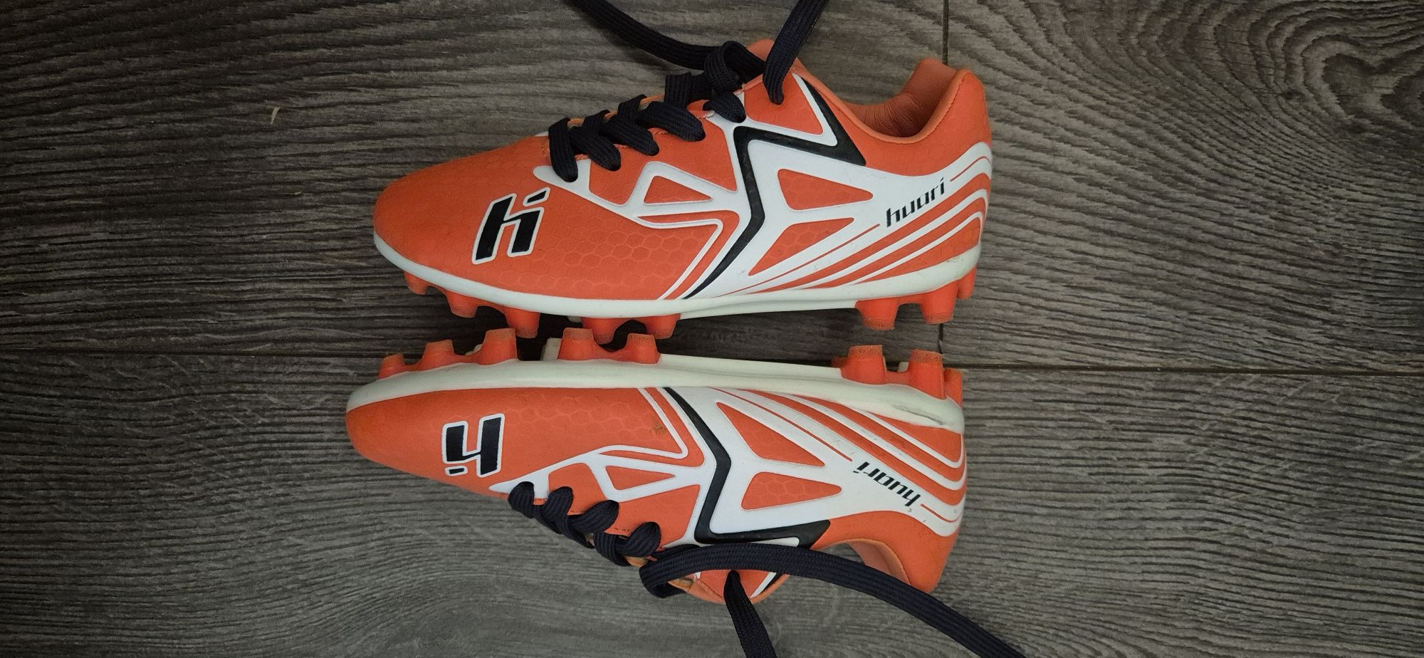 Korki buty piłkarskie dziecięce Huari r. 28 pomarańczowe