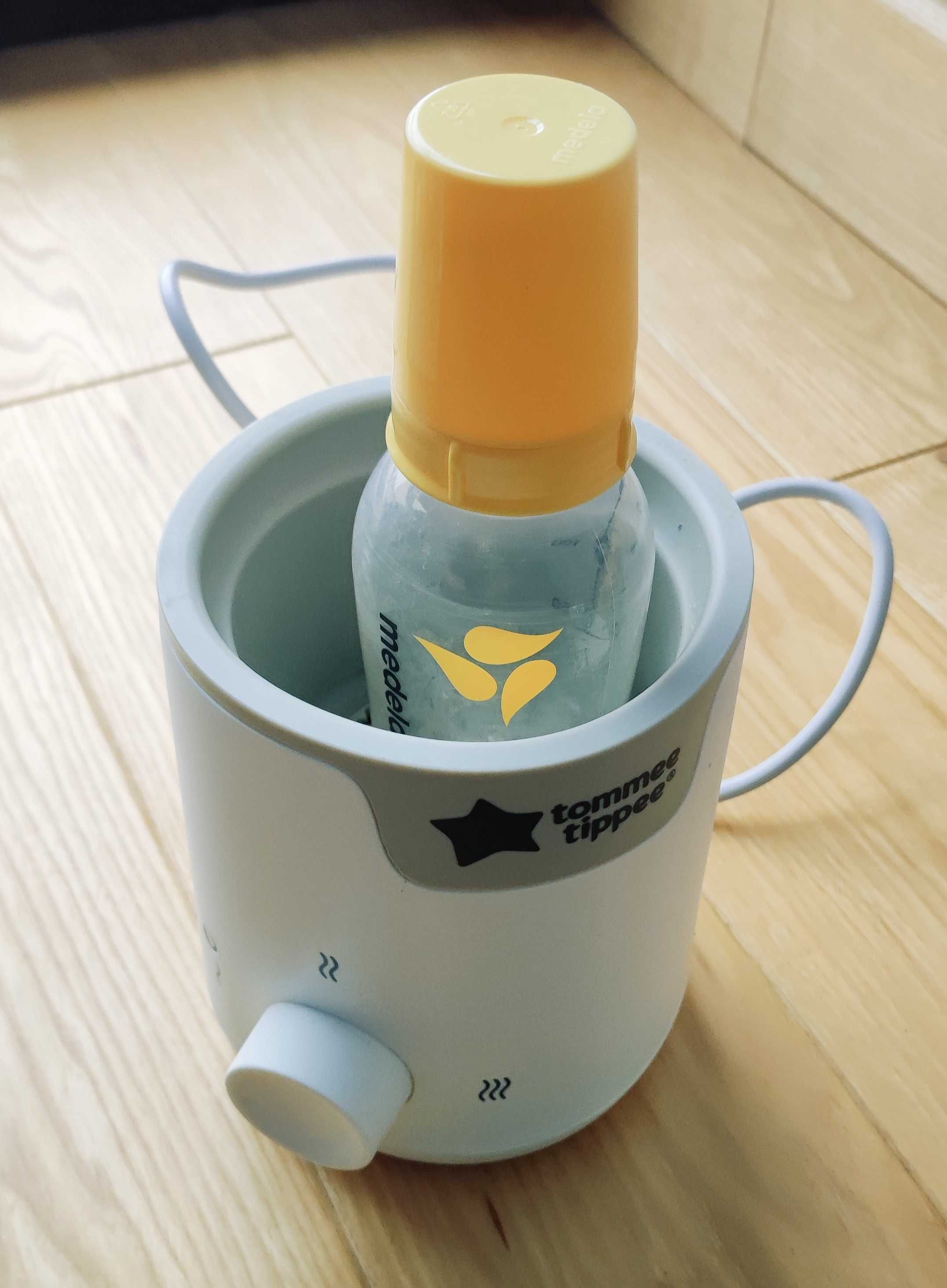 Laktator medela/ podgrzewacz tommee tippee