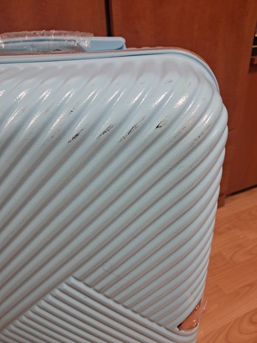 Walizka  na 4 kółkach, niebieska. 60/40/25.