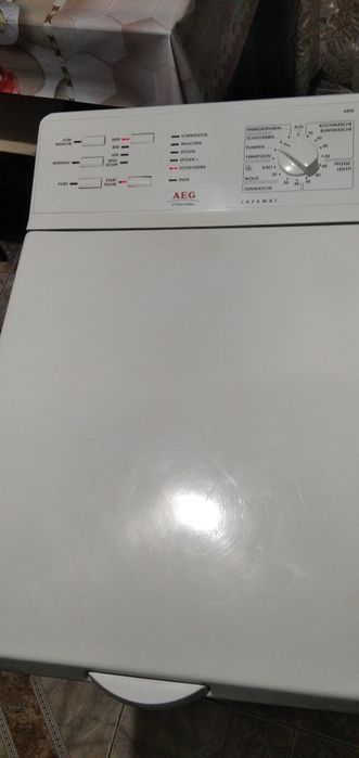 Вертикальна пральна машина