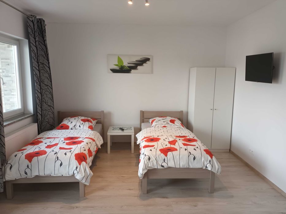 NOCLEGI POKOJE MIESZKANIE APARTAMENT dla firm i kadr kierowniczych