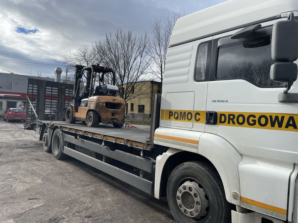 Pomoc drogowa Transport maszyn budowlanych i rolniczych laweta,holowni