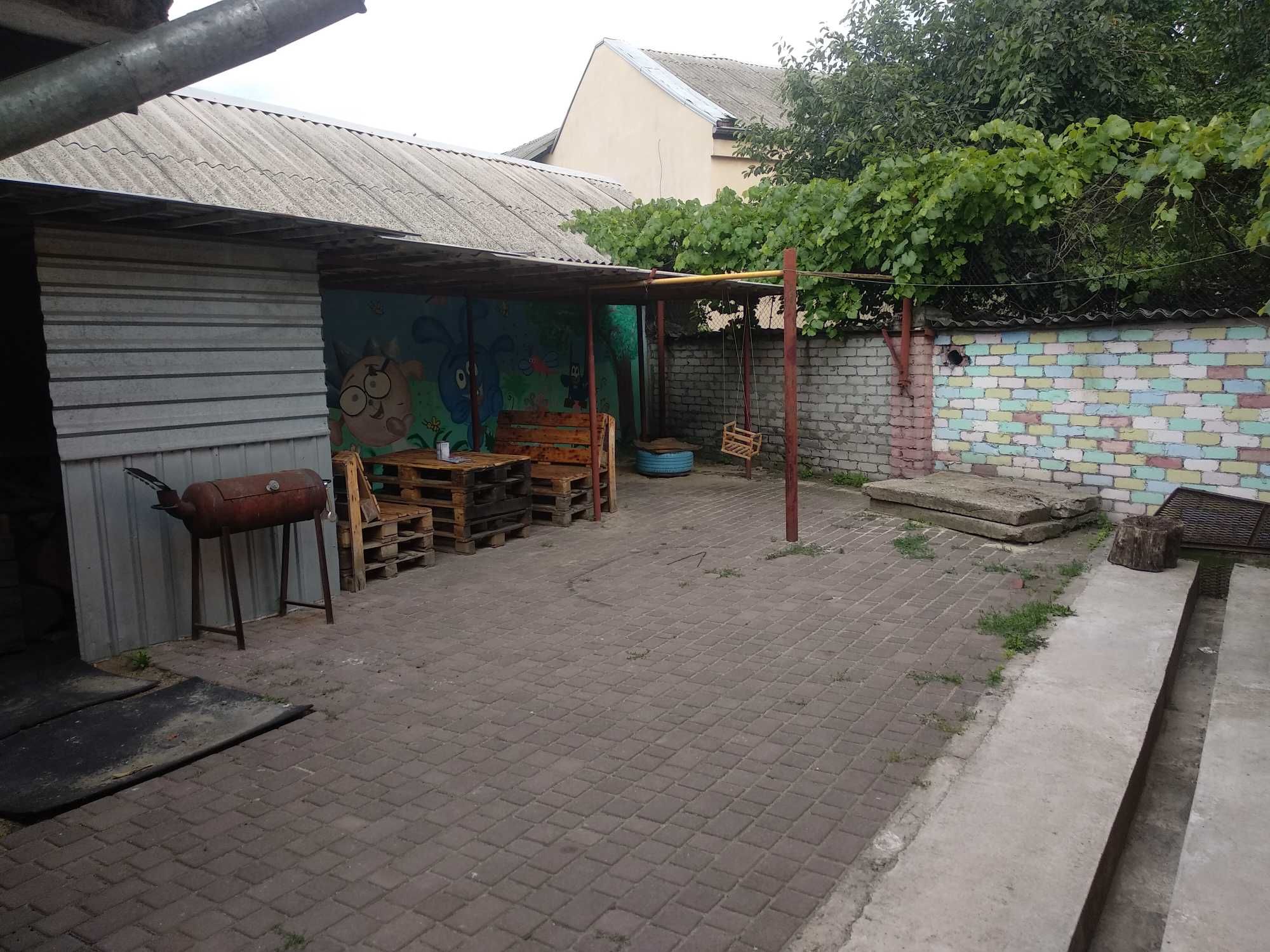 Продам Дом с верандой и гаражом в Центральном районе низ Савченко