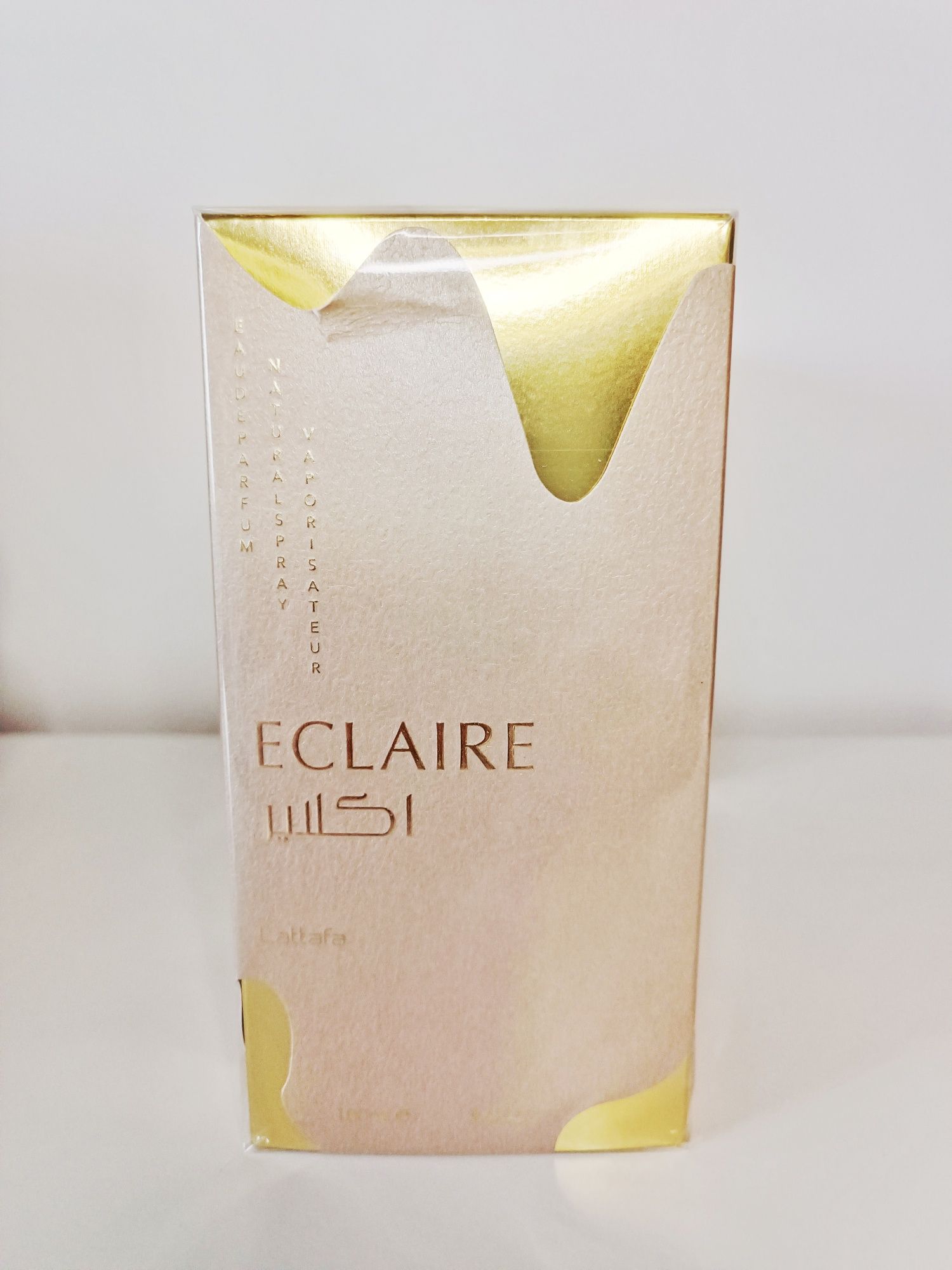 Lattafa Eclaire perfume árabe