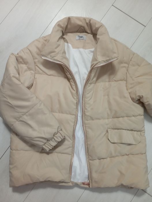 Пуховики і куртки